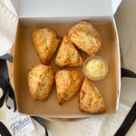 Load image into Gallery viewer, Cheddar Chive Scones with Hot Honey Butter

